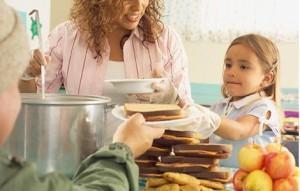 girl-serving-soup-kitchen